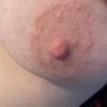Close up of the wife’s left nipple
