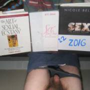 A view from above of my dick & 3 sexual books on my bed. Pic taken with C7070 camera.