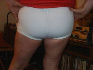 I love showing my ass off in my tight white football shorts just as I do showing it bare, it turns me on knowing people are ogling my ass!!!