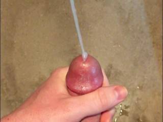 Masturbating in the shower. Biggest spurt of the day after edging for a few hours. It felt so good to finally let it go. I wish some ladies were around to help out.