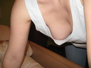 Braless, breast hanging, a glimpse of nipple - exquisite