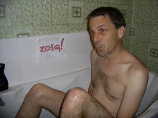 here\'s my gorgeous hubby taking a quick bath - any one want to help him?