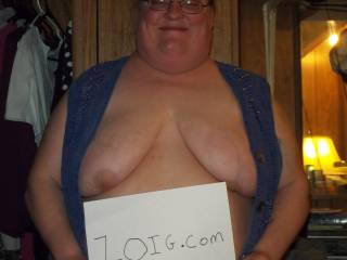 Your vest looks fine, shows off those big gorgeous tits, they look awesome