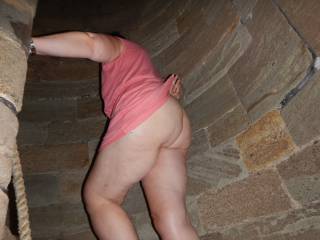 Climbing the stairs at Beaumaris Castle just wearing a short dress and no knickers