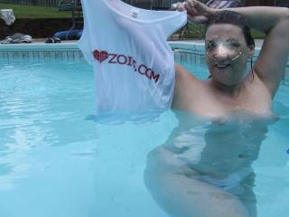 After noon by the pool getting wet for ZOIG.com. Showing off my wet tee shirt.  You like?