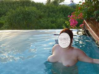 Well when your wife is naked outside in your private pool, and her gorgeous tits are practically floating on the water, is there anything better in life?