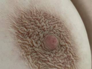 Bbygrl’s beautiful right nipple. Isn’t that just the sexiest hard nipple?
