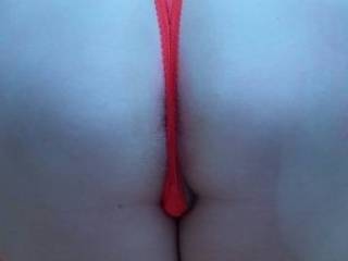 Hubby says he loves my ass in such a tight red thong. He says it makes him want to fuck me doggy style until a nice full creampie. What do you say?