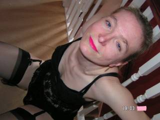 In my new black lingerie, compliments my lipstick don\'t you think?