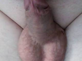 Small soft cock with balls full of cum. Tell me what you think please.