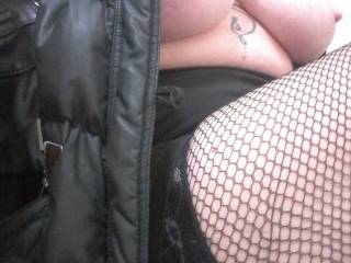 Thighs in fishnets and her tits out, Sally has her coat open to give some locals a nice view!