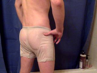 Me in some tight wet boxer briefs, showing off my ass after the gym