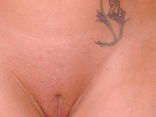 My hummingbird tattoo.  Love it when L cums over it.  Would love to see your cum over it too.