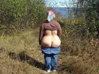 I would love to get behind her and play with her awesome ass for a long time ... would also love to explore all of her magnificent curves!