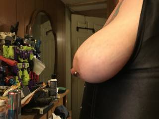 Side view of tits in corset.