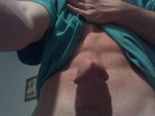 nice six pack sitting above a perfect looking cock.