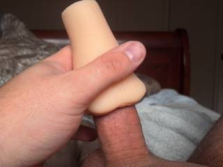 Masturbating with a toy