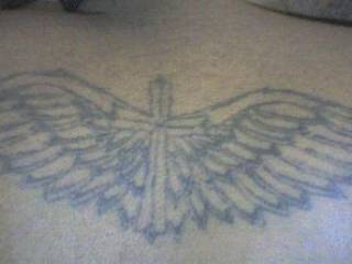 On my upper back, my only one and one of a kind. More to come.