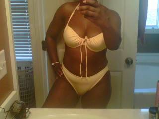 i do like that bathing suit too... but i'll suggest something much smaller... ummmh, may be a lace only... showing those tremendously sexy nd erect nips and under there just covering the hot as hell red opening and exposing those sweet awsome lips of that hottest wet pussy.... how does hat sound to you?....