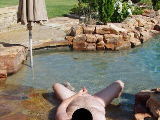 Hubby naked and nervous in our pool...our female neighbor was in her back yard with her female friends and hubby's cock was open for display!  I wonder if they got a look?  It made me wet and horny for sure seeing my man naked and vulnerable!!!