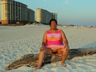 Upskirt pussy flash on a public beach!
