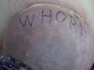 Whore written on my bound tit with a hair barrett on my nipple