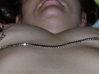Nipple chain fun.  Do you like my nipples?