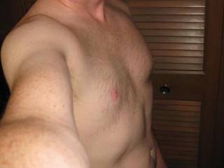 A selfie of my chest where I love seeing cum dripping down