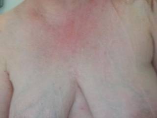 Heavy wet milk filled tits hanging free in the shower