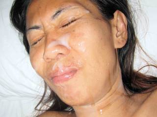 Lek, skinny Thai hottie gets my full load over her face....