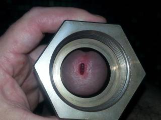 Using a huge heavy metal nut to spread open my urethra just a little bit