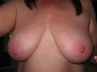 Another view of those fabulous 36DD\'s. They need a dick or load of cum for decoration, any takers?