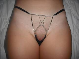Ooooh yes that is so sexy/kinky....we love it.  Hubby would like to see that on me too.  That would make slipping a finger or two in that pussy so easy.  May we?  K & G