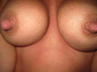 truly lovely tits and nipples! what a delight it would be to lick suck and nibble on those. Seeing them covered with two loads of hot cum would also be special don't you think?