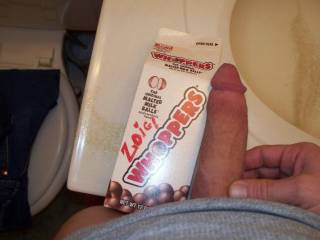 ok girls heres his limp cock with a ZOIG WOPPERS box by it so you get an idea of how big he is!! any gals want to cum make him hard its an awesome ride;)