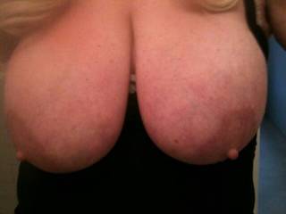 Wife's tits hanging out waiting for someone to start playing with them