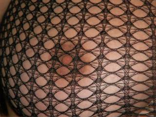 love the way a nipple looks coming thru a fishnet top i just wonder how many agree