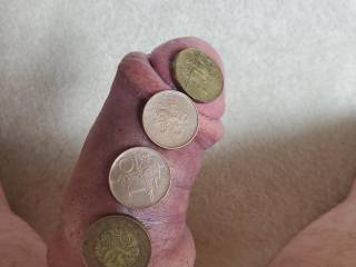 Coins on fat cock