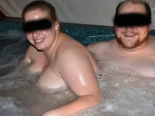 hubby and new friend having fun in hot tub