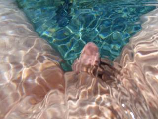 An underwater dick pic while swimming nude in my pool.
