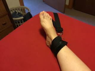 The bed restraints were off the bed for a while and needed readjustment. This time I looped them over the headboard corners and used the bottom corners for her feet. This didn’t hold her legs completely spread but I liked the view.
