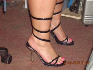 WOW! ... I'd love to worship her feet which look really beautiful in this sexy pair of heels. Also love her thick ankles & thick shapely calves. Ultimately I would like her to play with my cock using her pretty toes, which would make me cum buckets!!!