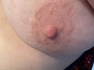 Close up of the wife’s left nipple