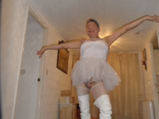 Hi all
my hubby got me another tutu but I think the boots set it off just right.
dirty comments welcome
mature couple