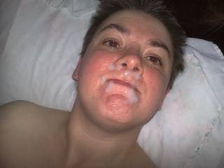 Facial shot with cum near corner of mouth