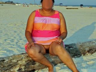 2009 summer vacation!  Upskirt pussy flash on a busy beach!