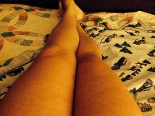 I love to touch and feel so yes, I would love to massage, stroke and kiss your sexy legs and then wrap them around my head and shoulders as I lick and kiss your sweet pussy!!  Oh and you have very cute feet!