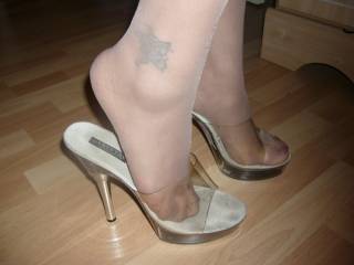 i love those sexy clear mules. i use to have a pair and loved the way my hosed feet looked in thek with shorts. men love it. made so many dicks hard wity that outfit