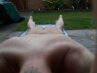 The best way to enjoy the garden, any ladies care to rub some cream on me?