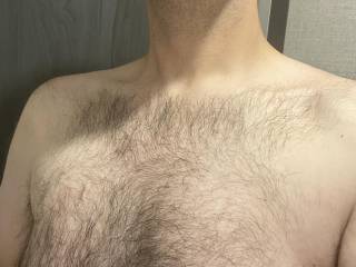 Showing off the chest hair. Just about time for a trim.